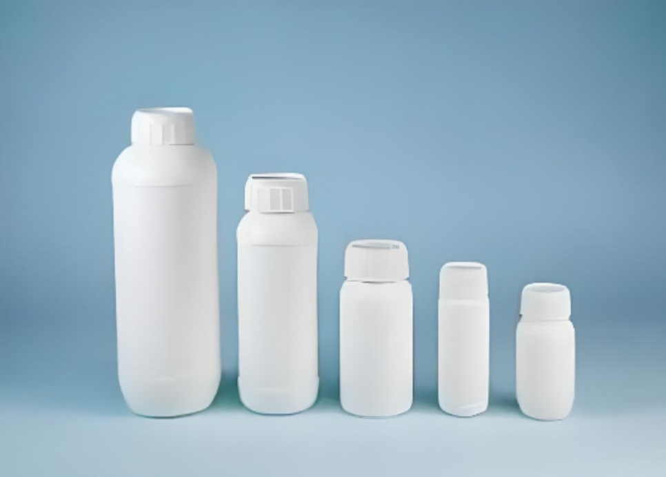 Five white color bottles of agrochemical