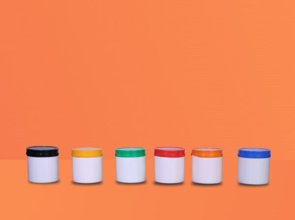 Cream Jars by Mono Industries: Sleek, white jars perfect for storing creams
