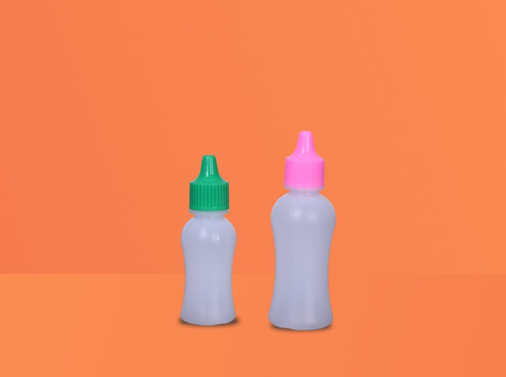 Plastic dropper bottles with colored caps, manufactured by Mono Industries.